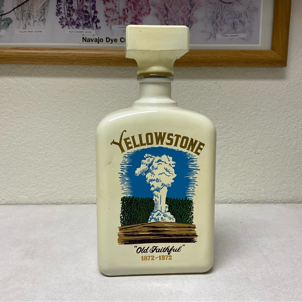 Vintage liquor bottle, bottom has rust as shown